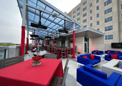 The Reserve Outdoor Lounge at Embassy Suites Olathe tables and chairs