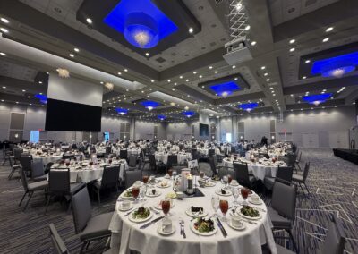 Olathe Conference Center set up for a Corporate Event with catered food at each table